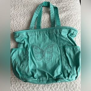 Tthirty-One retro metro Bag - Turquoise Cross Pop with purple butterfly